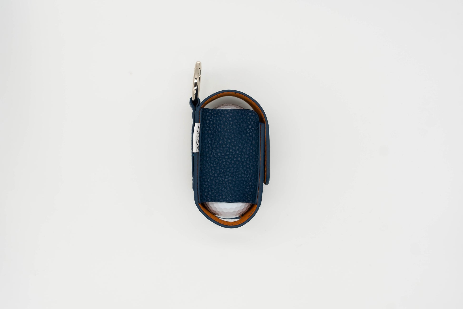 Navy leather golf ball pouch with noon brand logo at the side