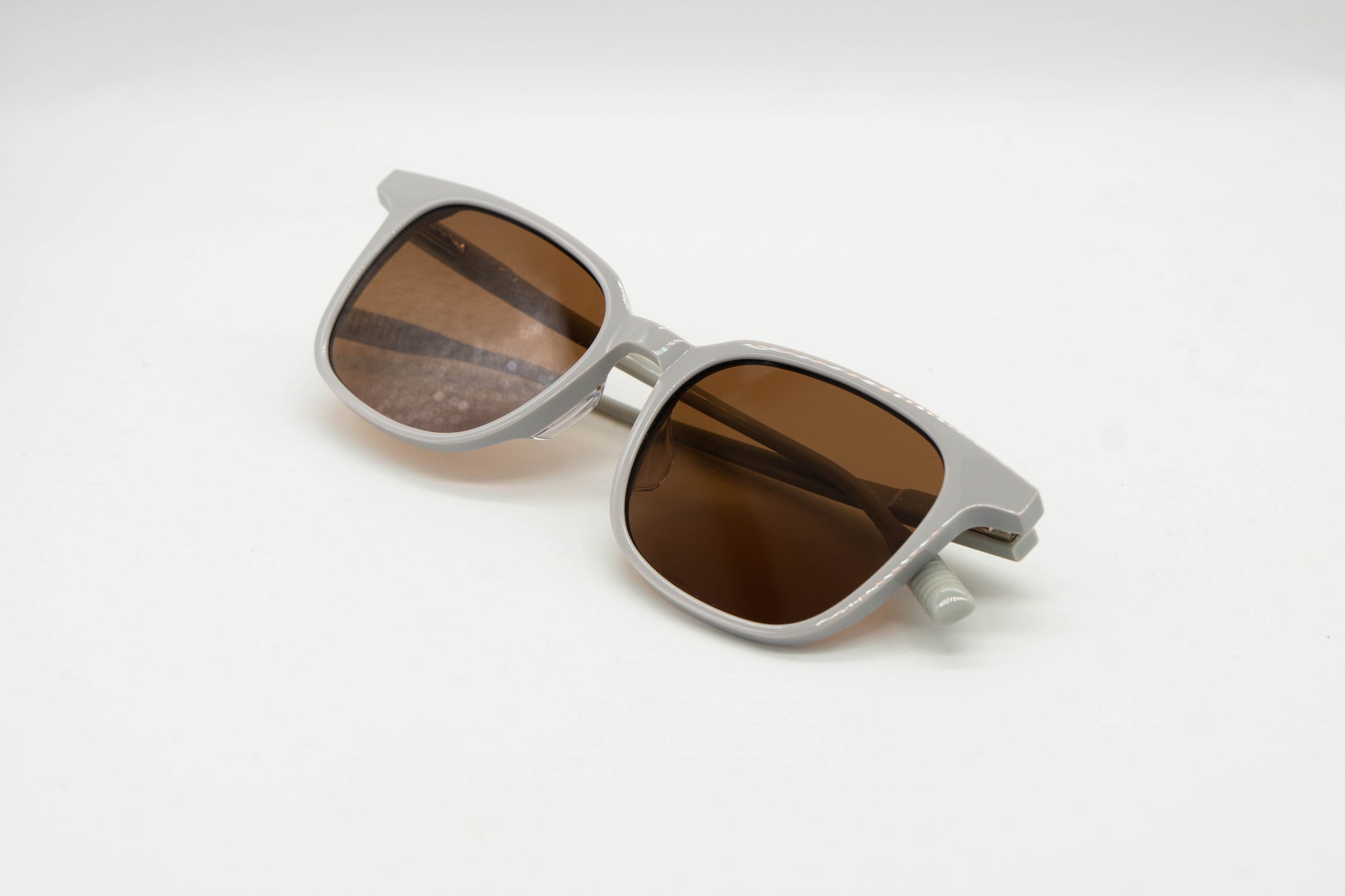 Paxton sunglasses in grey on a white background