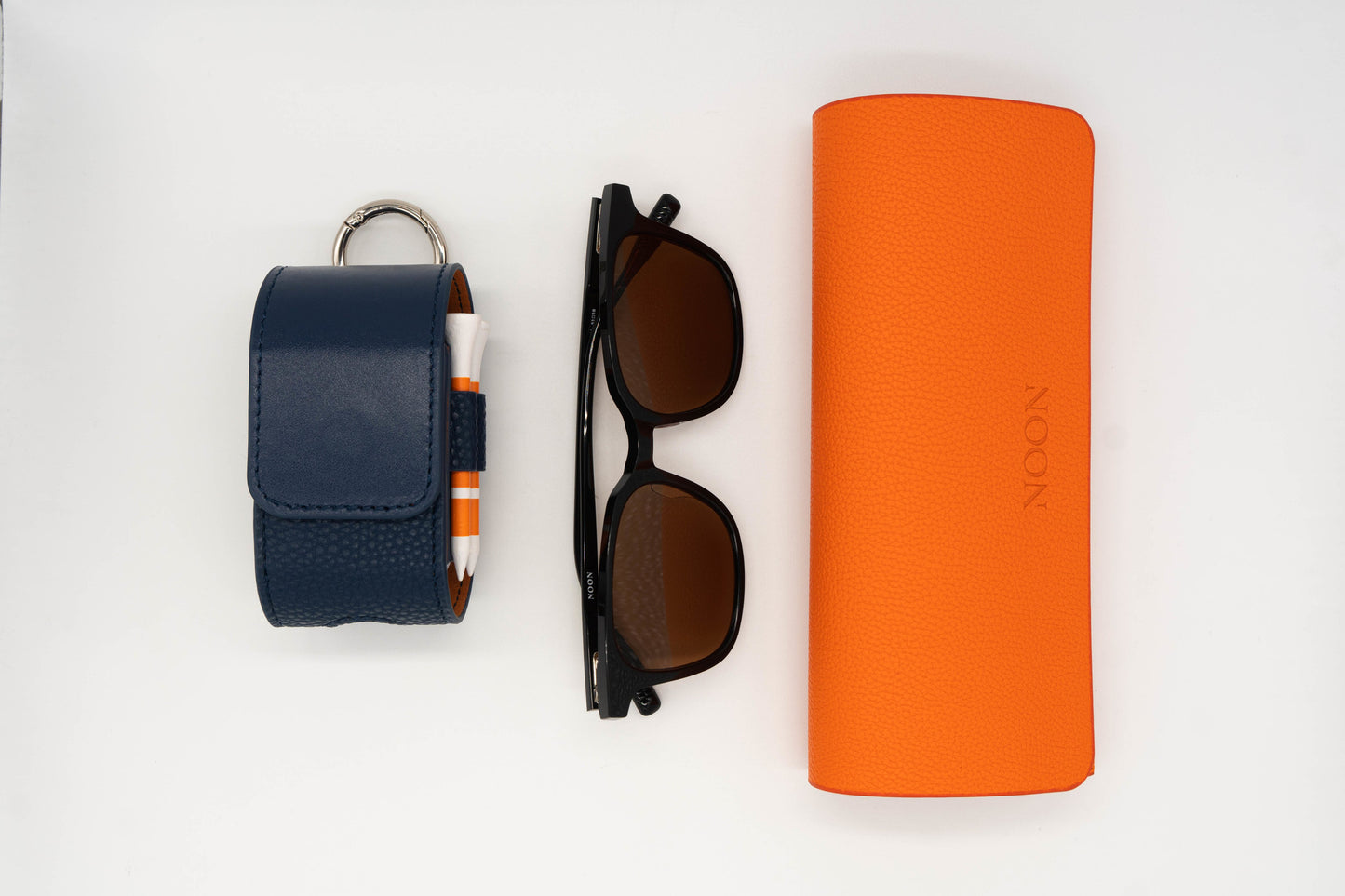 Full golf sunglasses set including the Paxton, Sunglasses case and a Navy Golf Ball Pouch