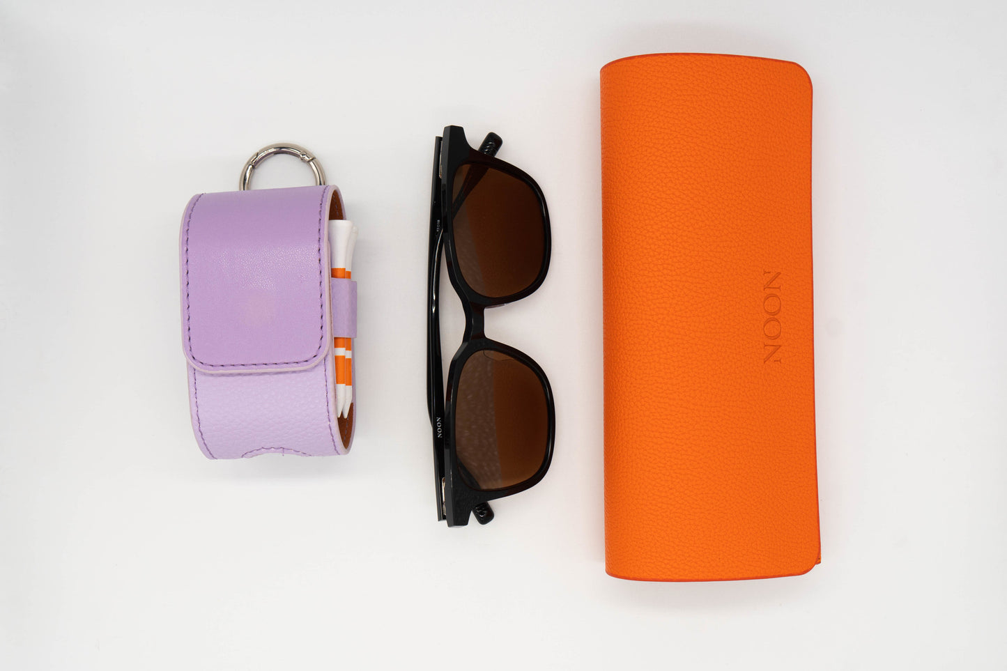 Full golf sunglasses set including the Paxton, Sunglasses case and a Purple Golf Ball Pouch